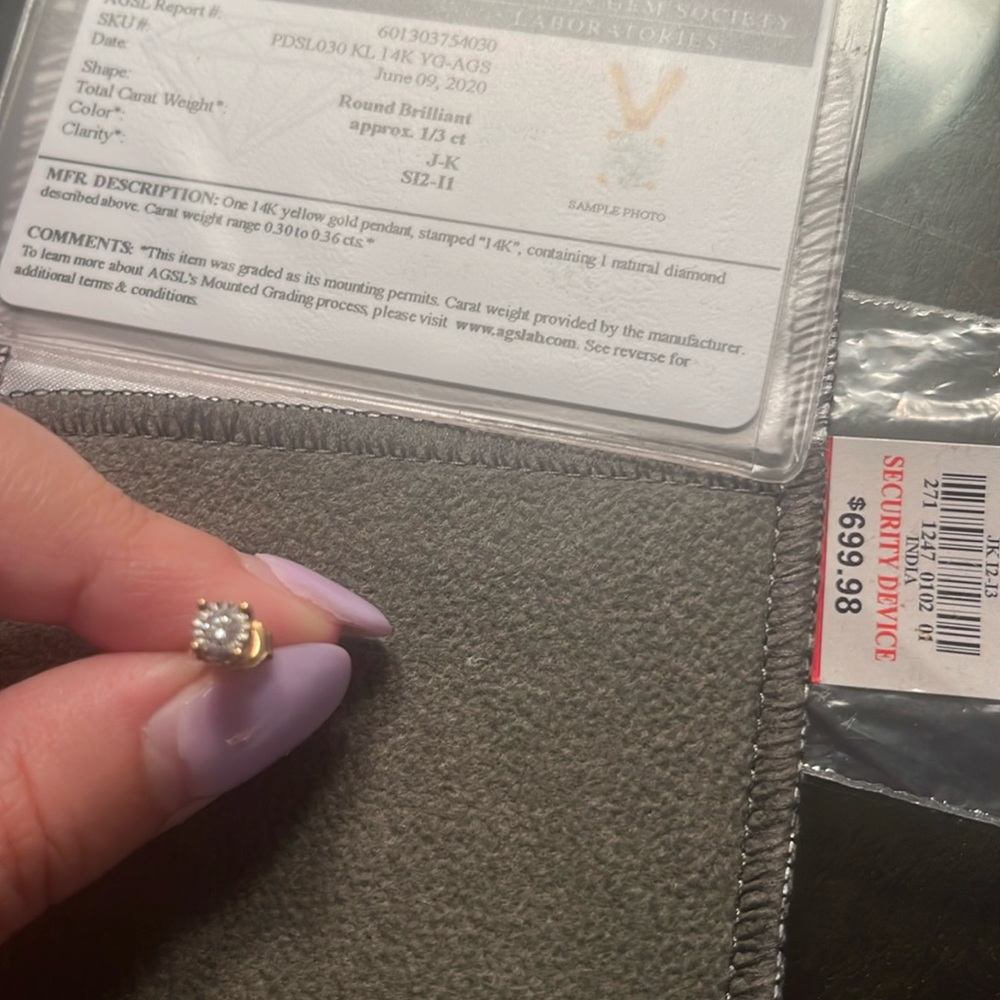10 karat, yellow, gold, diamond stud earring, half a carat with side diamonds